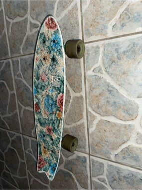 Globe Floral Cruiser Skateboard in Teal, Pink and Yellow